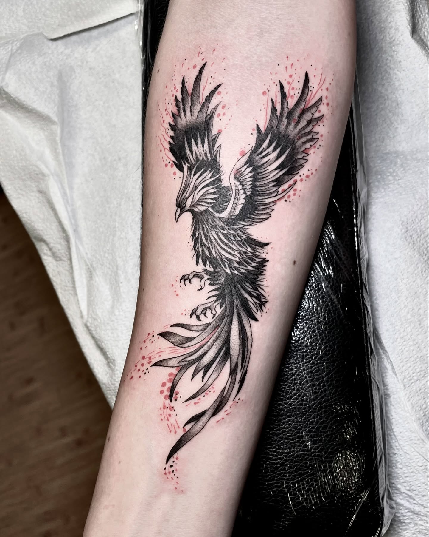 Phoenix dotwork tattoo on the forearm by Tattoo Artist