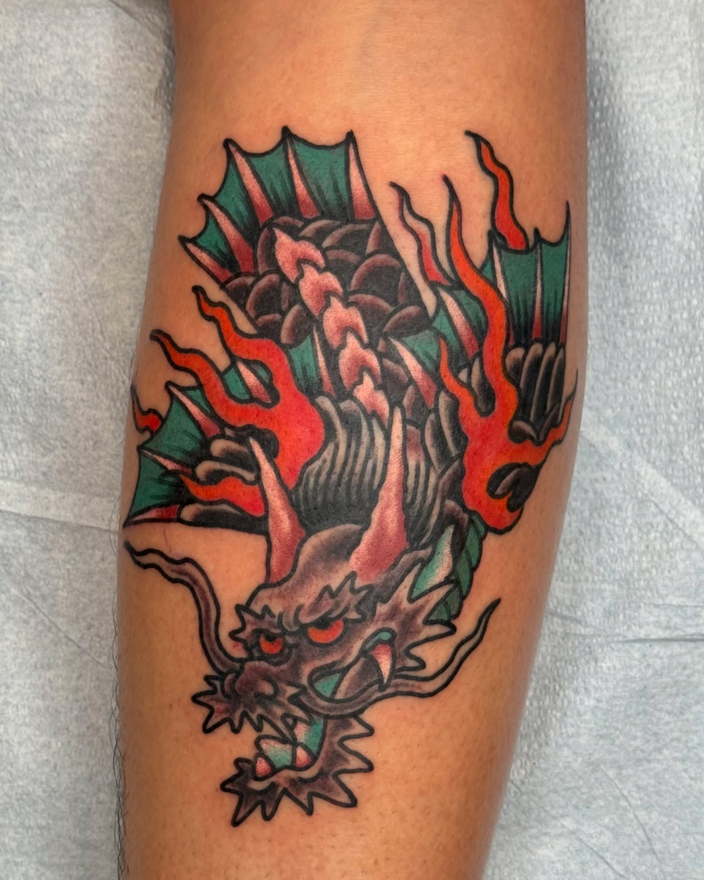 Dragon American traditional tattoo on the forearm by Dustin Paul Fowler, New York, New York