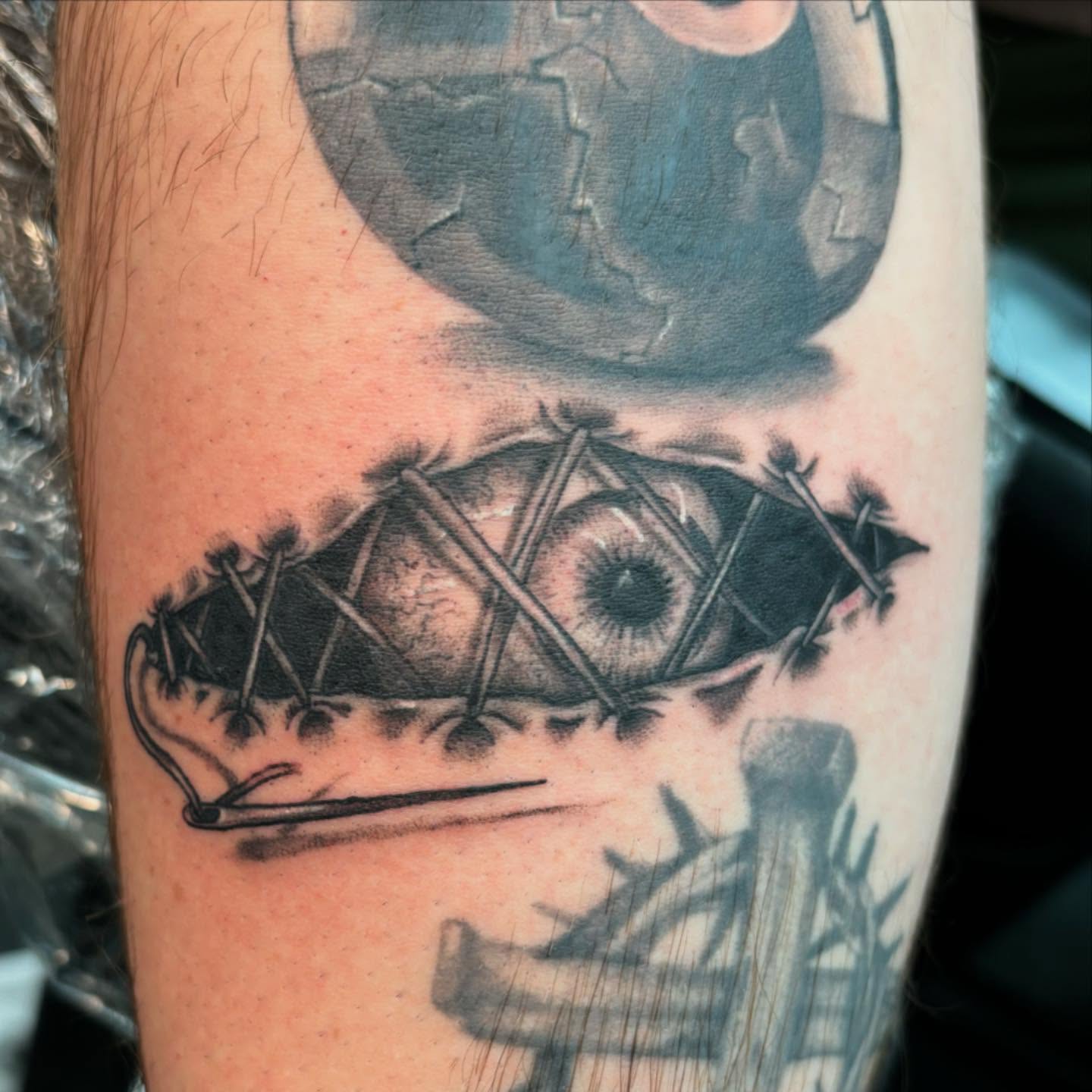 Eye with nails geometric tattoo on the forearm by @seibastattoos, Virginia Beach, Virginia