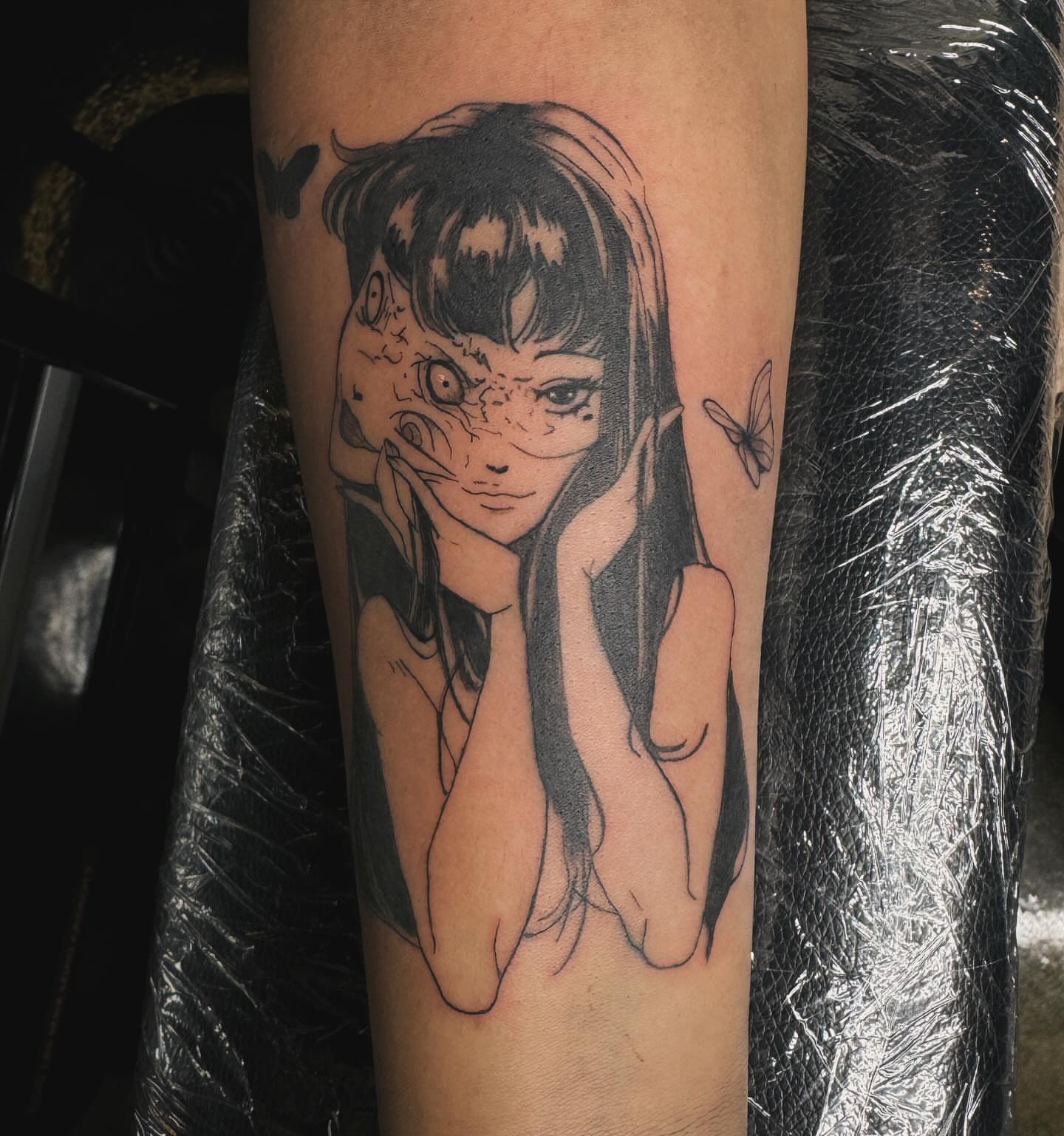 Anime girl anime tattoo on the forearm by V