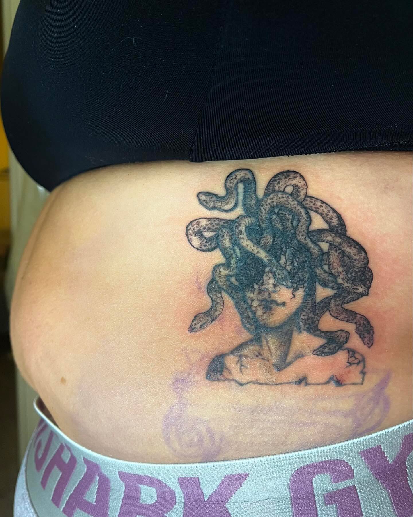 Medusa black and grey tattoo on the thigh by ren
