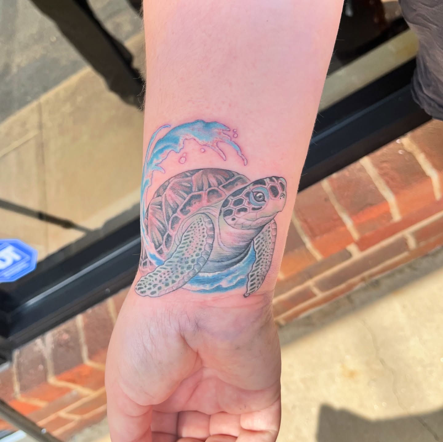 Sea turtle realism tattoo on the forearm by Angelique Sanders, Tellico Plains, Tennessee