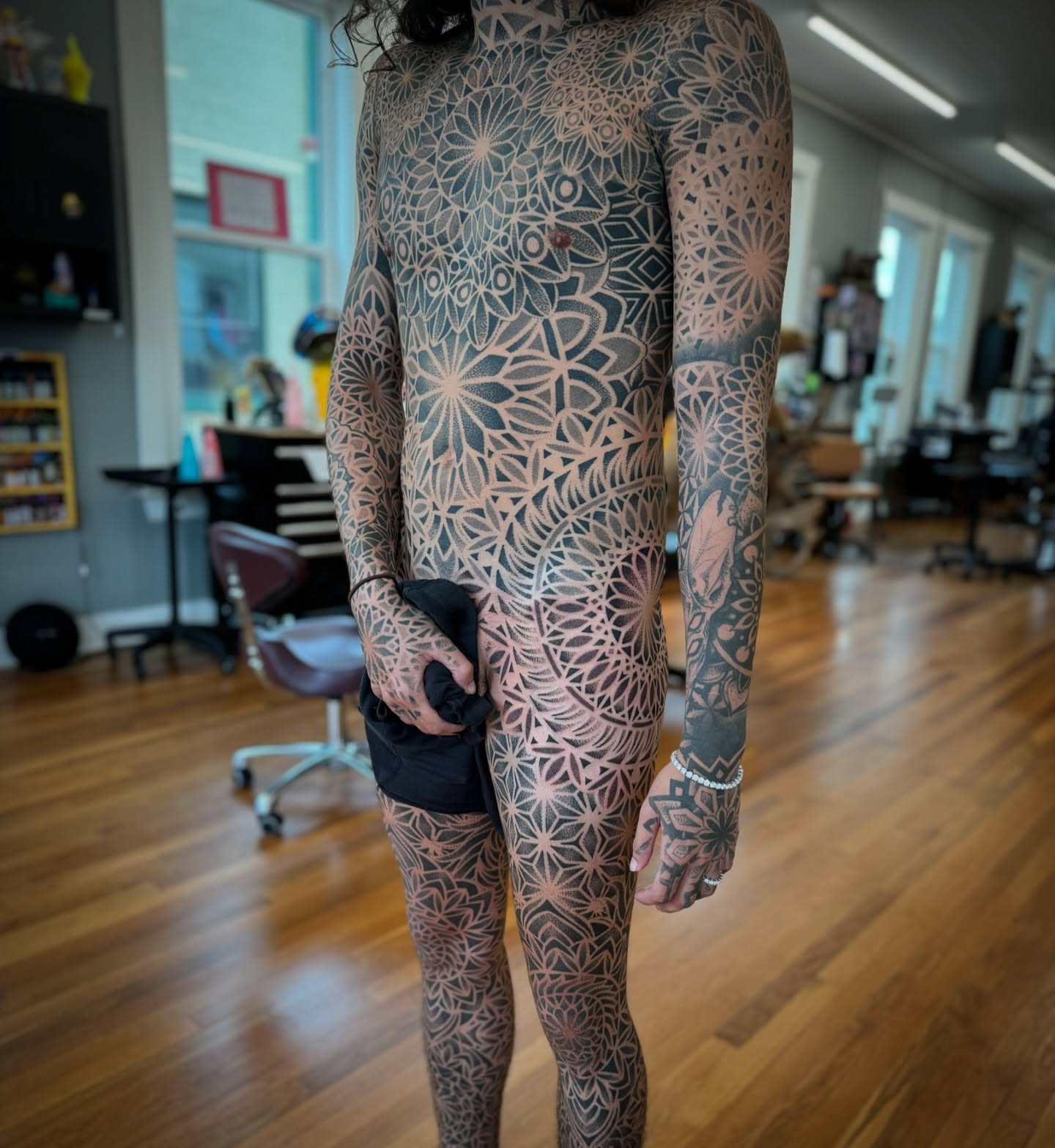 Geometric mandala geometric tattoo on the torso by Paul Schnell