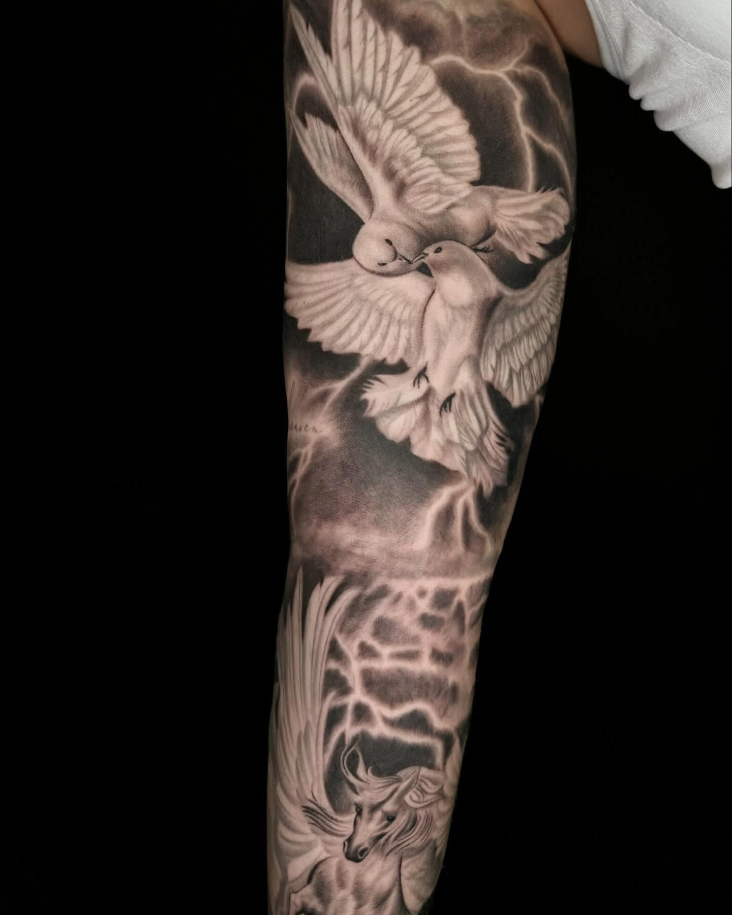 Tattoo by @tuannguyen_tattoo — realism, black_and_grey