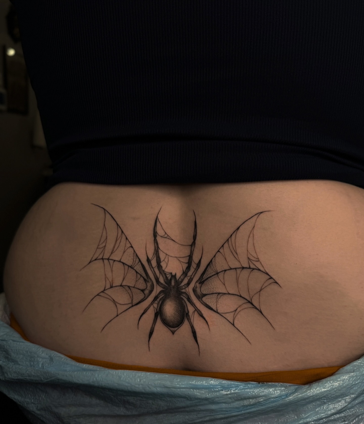 Spider dotwork tattoo on the thigh by Dee, San Diego, California