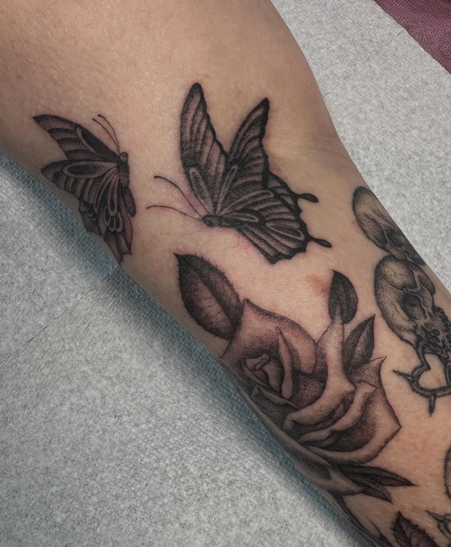 Butterflies and roses realism tattoo on the forearm by 𝖍𝖆𝖓𝖓𝖆𝖍