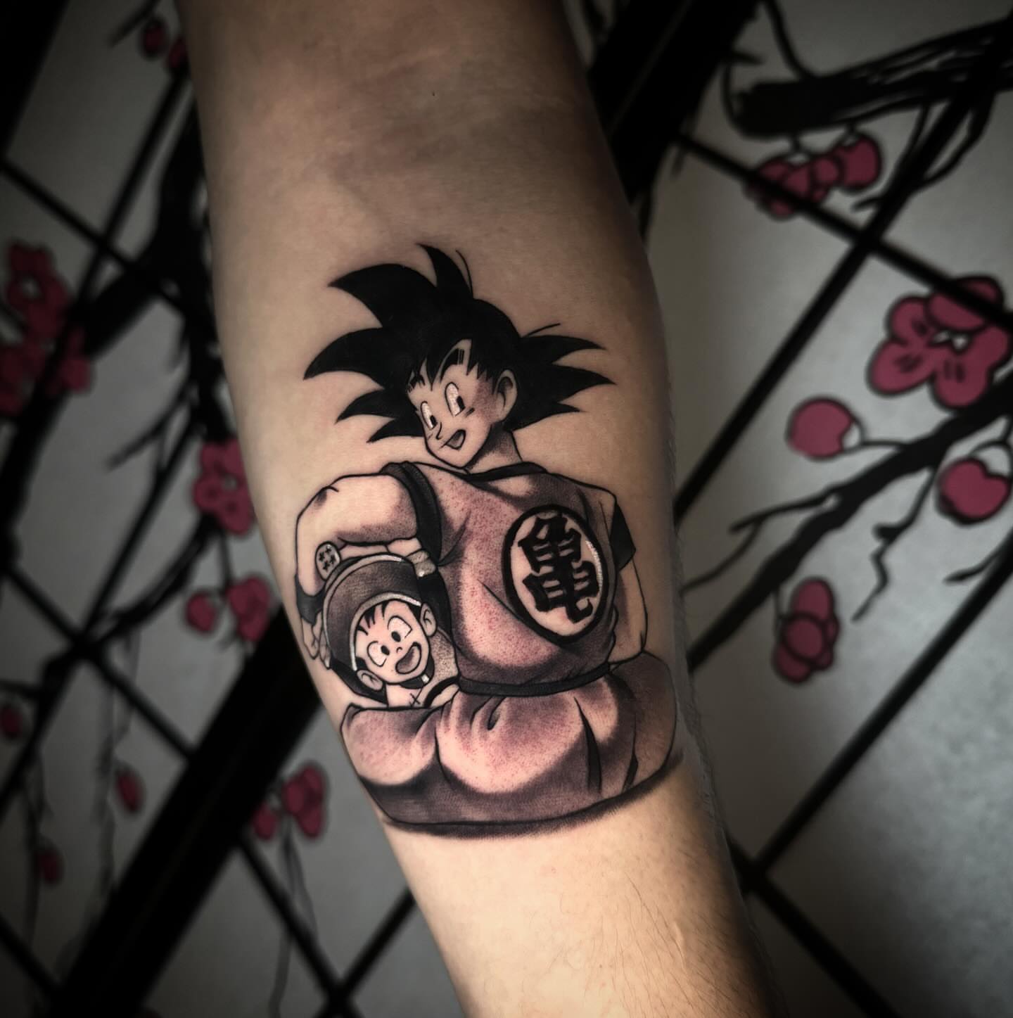 Son goku anime tattoo on the forearm by Bruce becerra tattoos