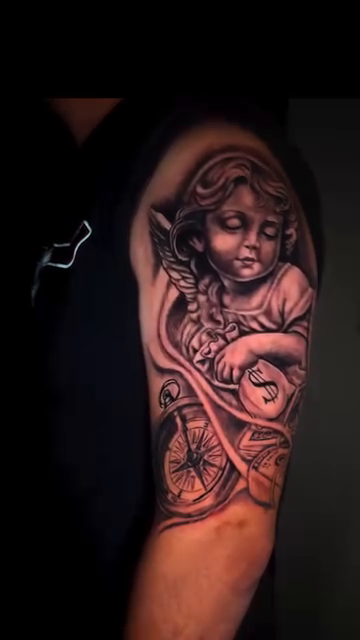 Cherub with compass realism tattoo by David Mariscal