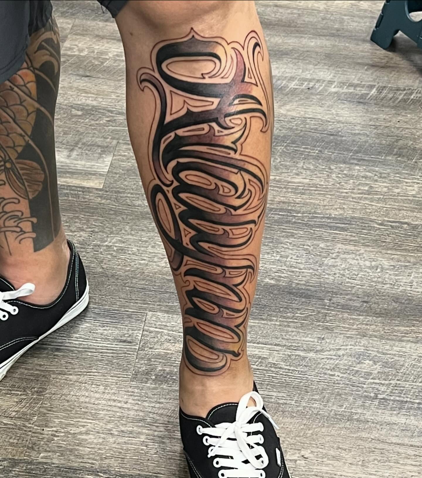 Script lettering lettering script tattoo on the calf by Niz Carrillo