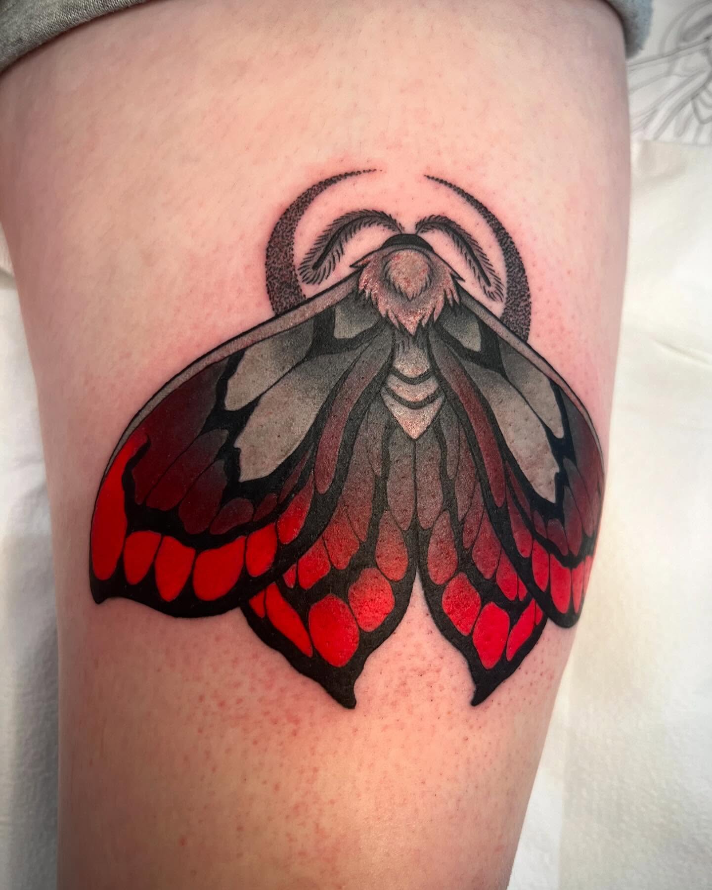 Moth dotwork tattoo on the thigh by Mia Manzanedo