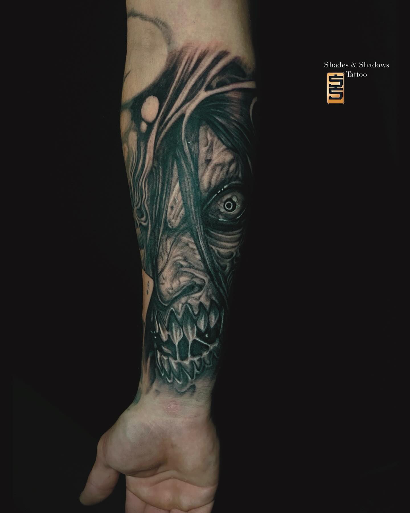 Horror creature dark realism tattoo on the forearm by Austin Tattoo Artist