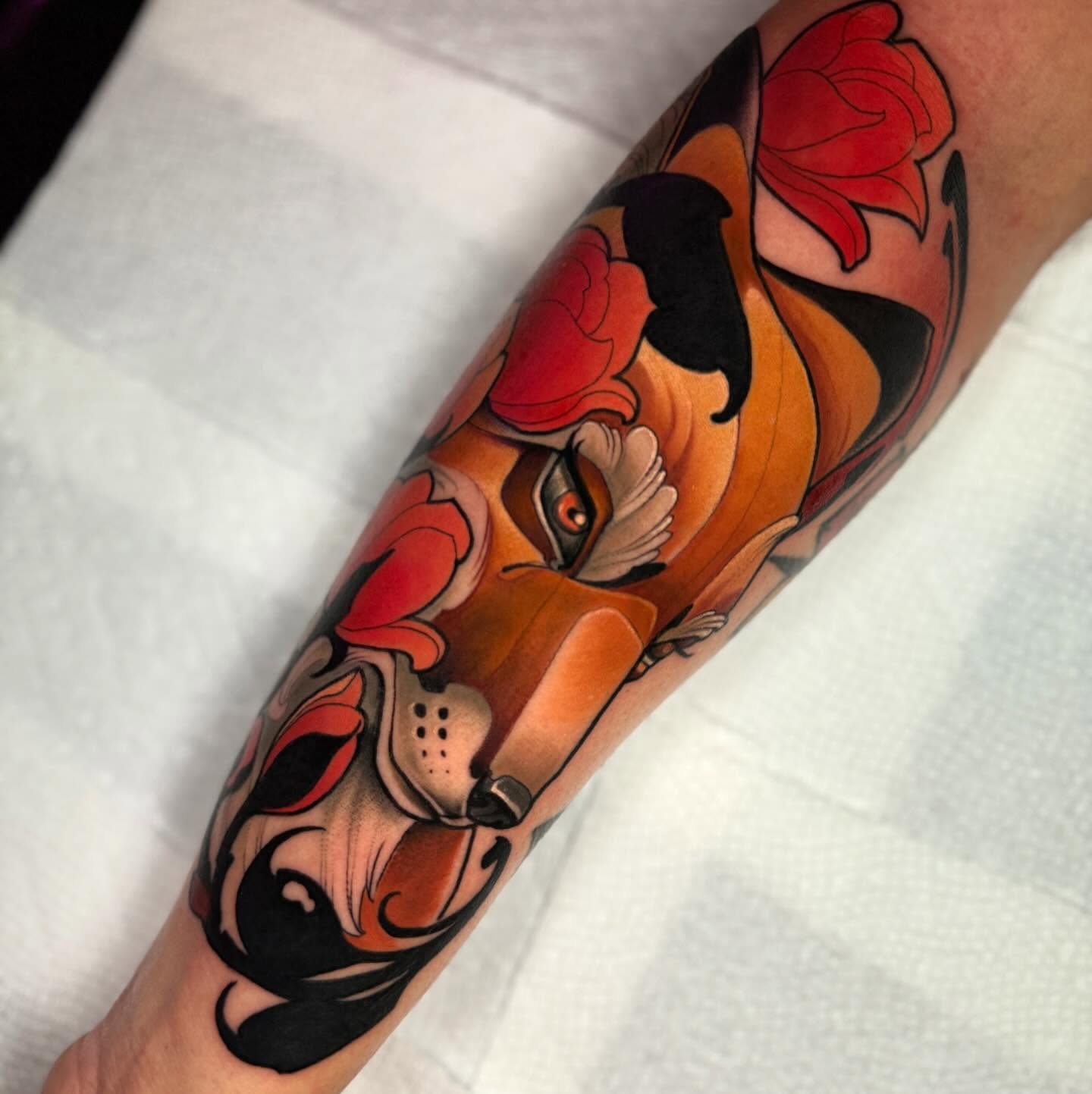 Koi fish and lotus American traditional tattoo on the forearm by Matt - Neotrad Tattoos, New York, New York
