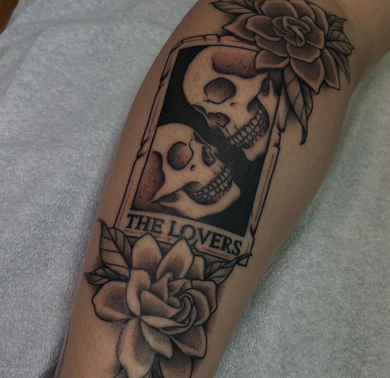 Skulls and roses realism tattoo on the forearm by Juan Vega (tony)