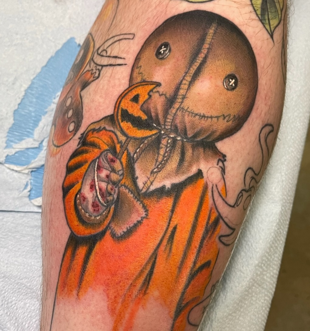 Pumpkin-headed creature dark realism tattoo on the forearm by Brittany Welsh, Marlton, New Jersey