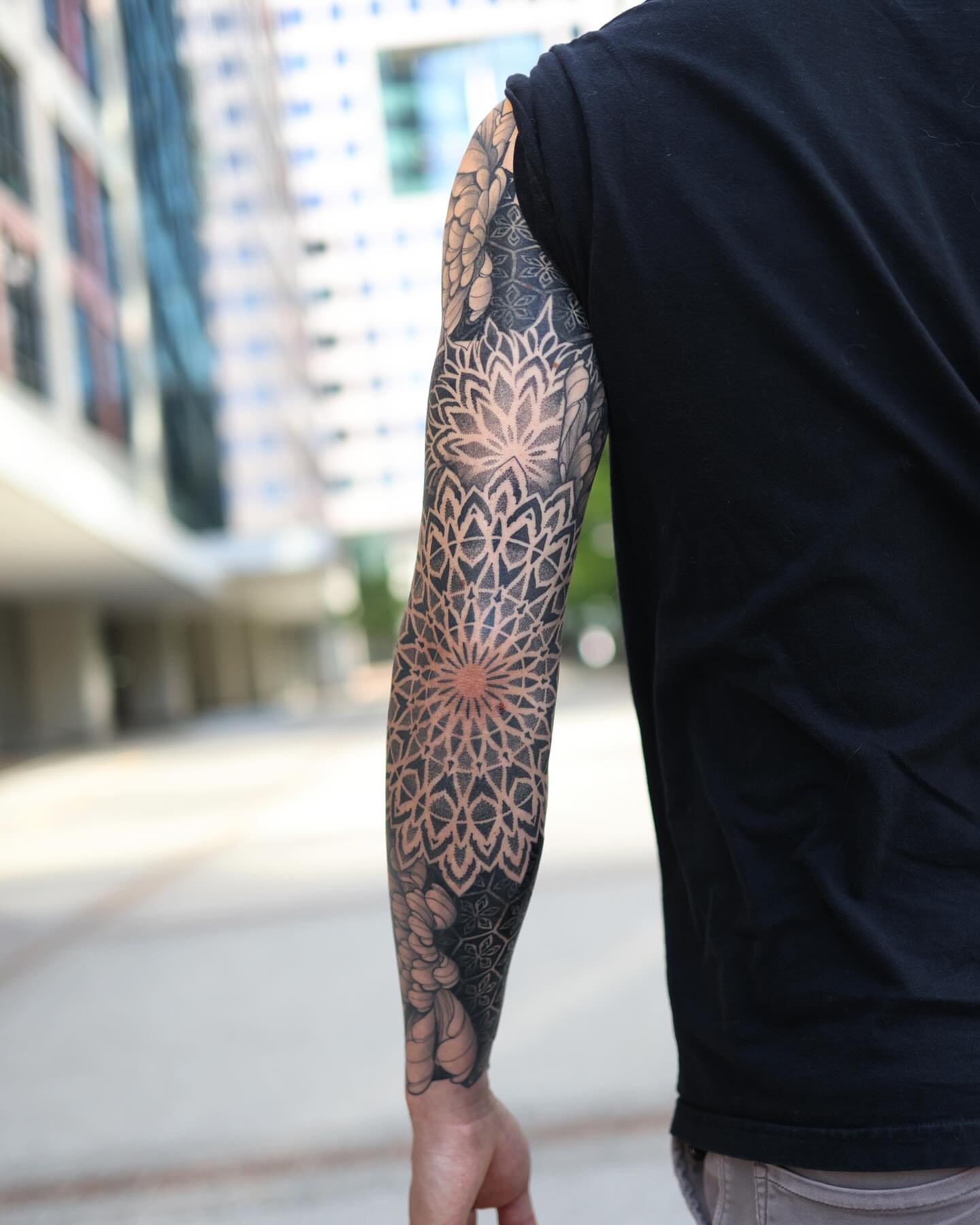 Geometric mandala geometric tattoo on the forearm by Laure Conzales