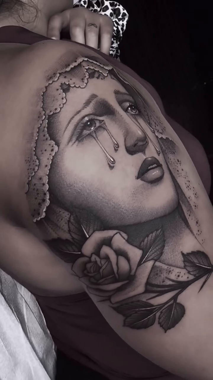 Weeping woman with roses realism tattoo by Luna Lucero