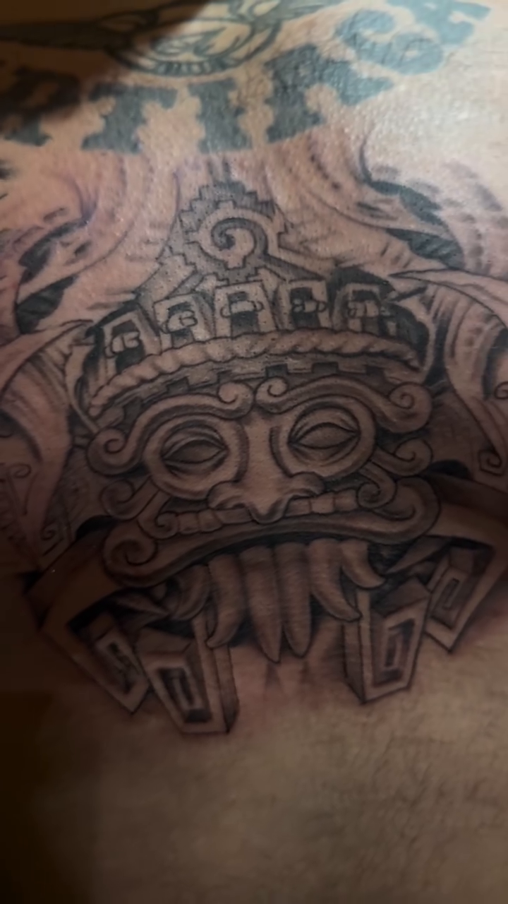 Mayan mask dark realism tattoo by Bernie calderon, Fresno, California