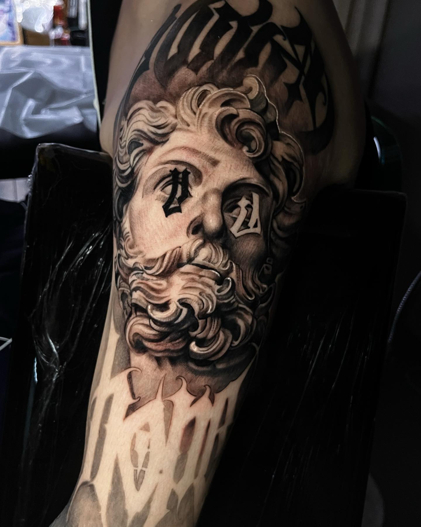 Bearded man's head realism tattoo on the forearm by Duo