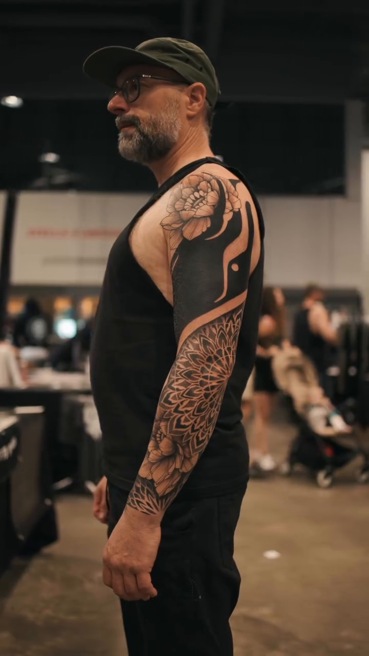 Full sleeve tattoo blackwork tattoo by Laure Conzales