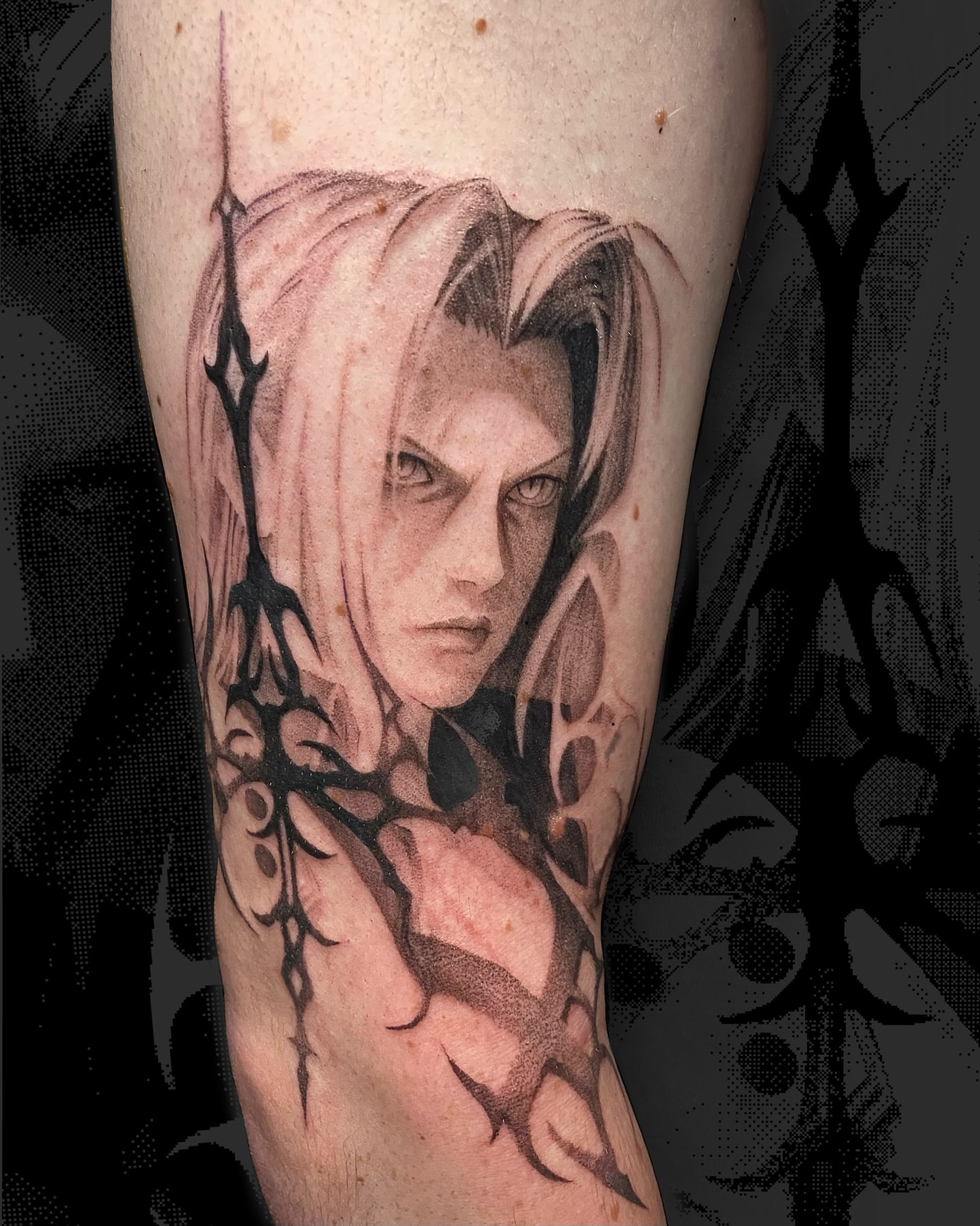 Portrait of a man realism tattoo on the forearm by Sarah