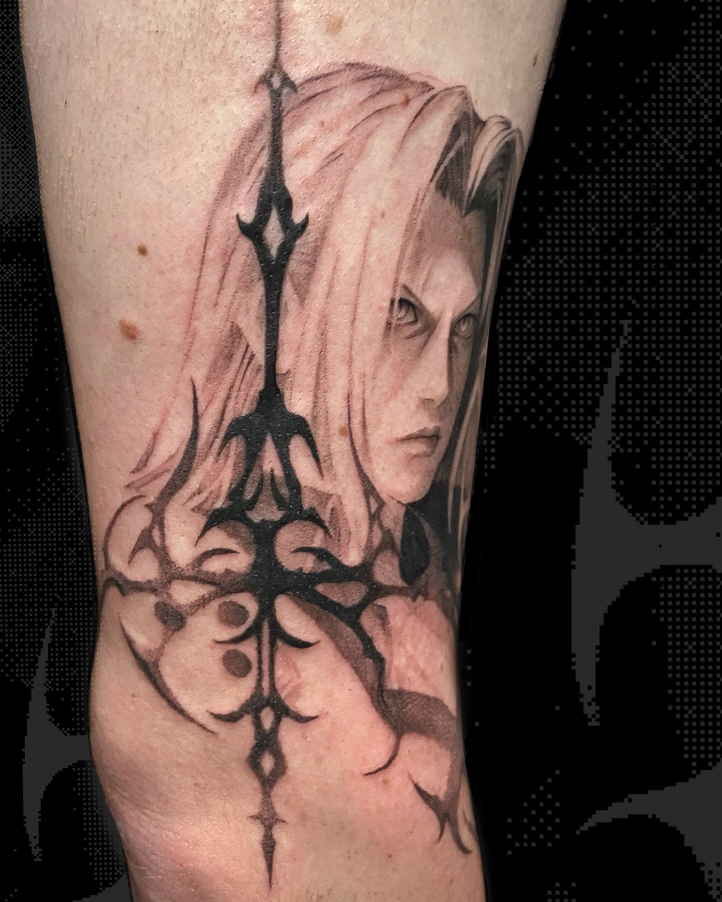 Anime character anime tattoo on the forearm by Sarah