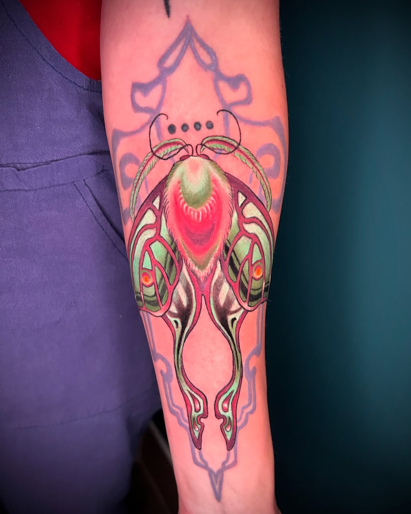 Alien creature dotwork tattoo on the forearm by Laura Babsie