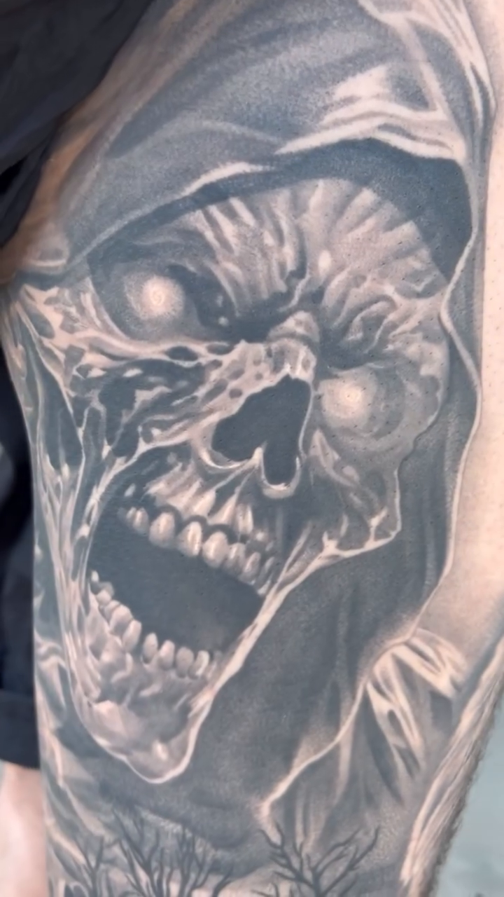 Grim Reaper in a graveyard dark realism tattoo by Brian Hernandez