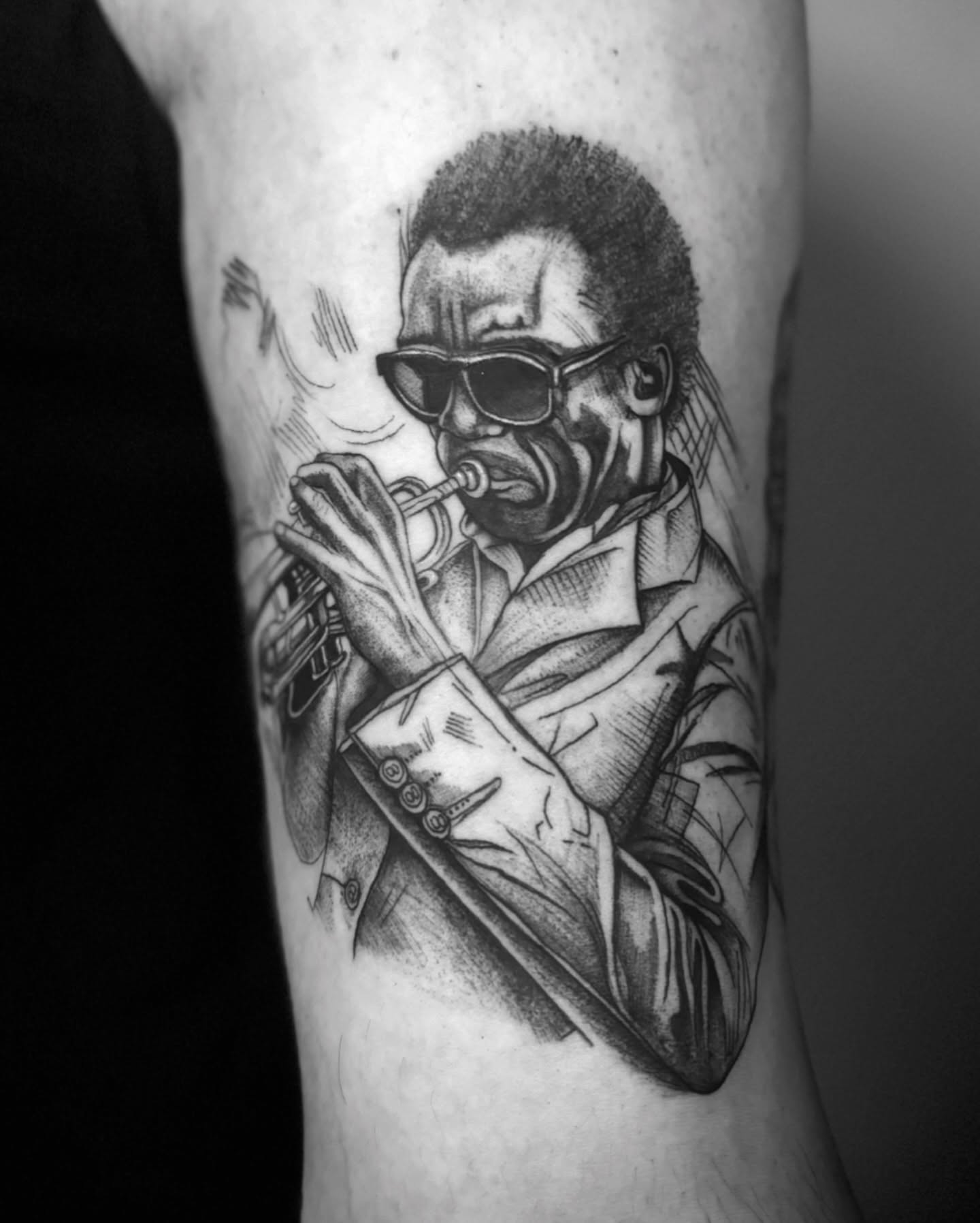 Jazz musician playing trumpet realism tattoo on the forearm by 𝕭𝖆𝖇𝖊𝖔𝖓𝖙𝖍𝖊𝖒00𝖓🌙🪬, Colorado Springs, Colorado