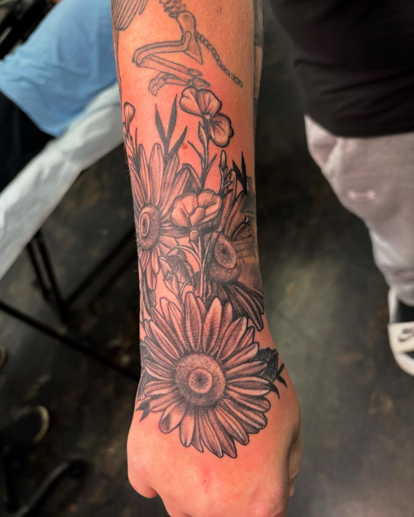 Flowers black and grey tattoo on the forearm by @seibastattoos, Virginia Beach, Virginia