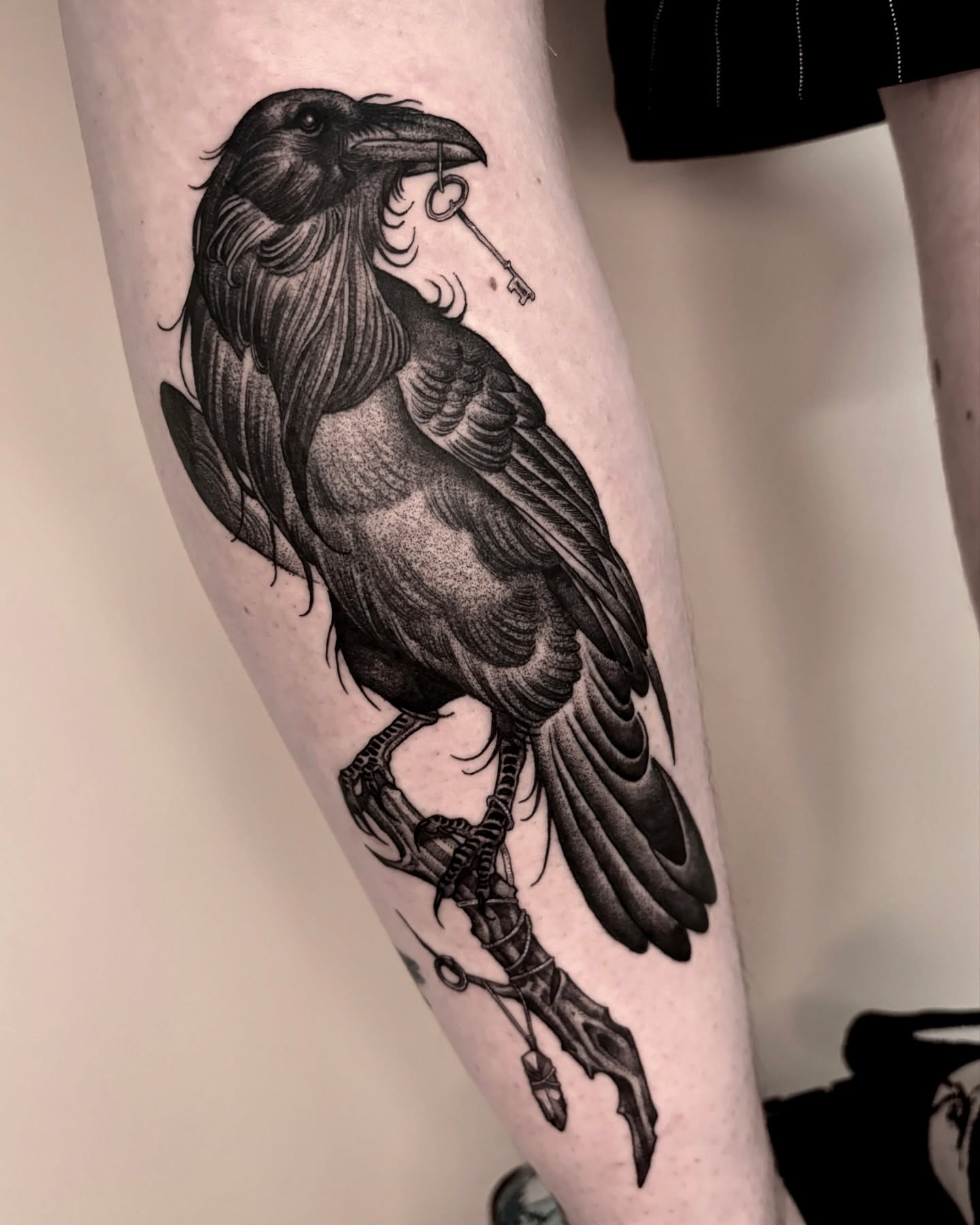 Crow realism tattoo on the forearm by Jens