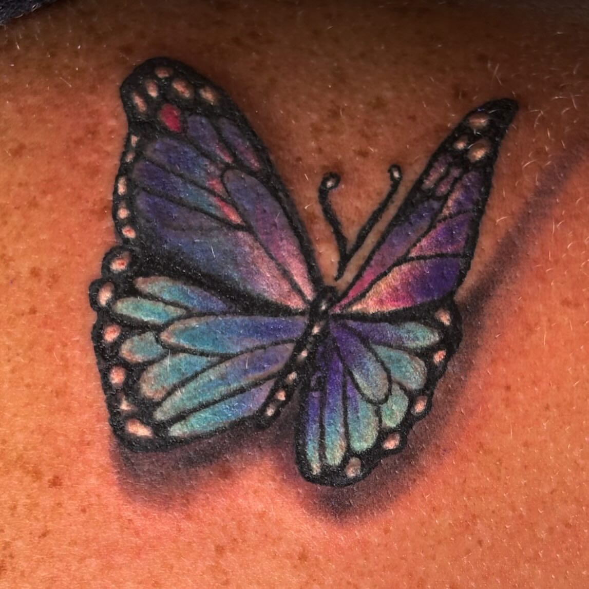 Butterfly realism tattoo on the shoulder by Bobby Glennon