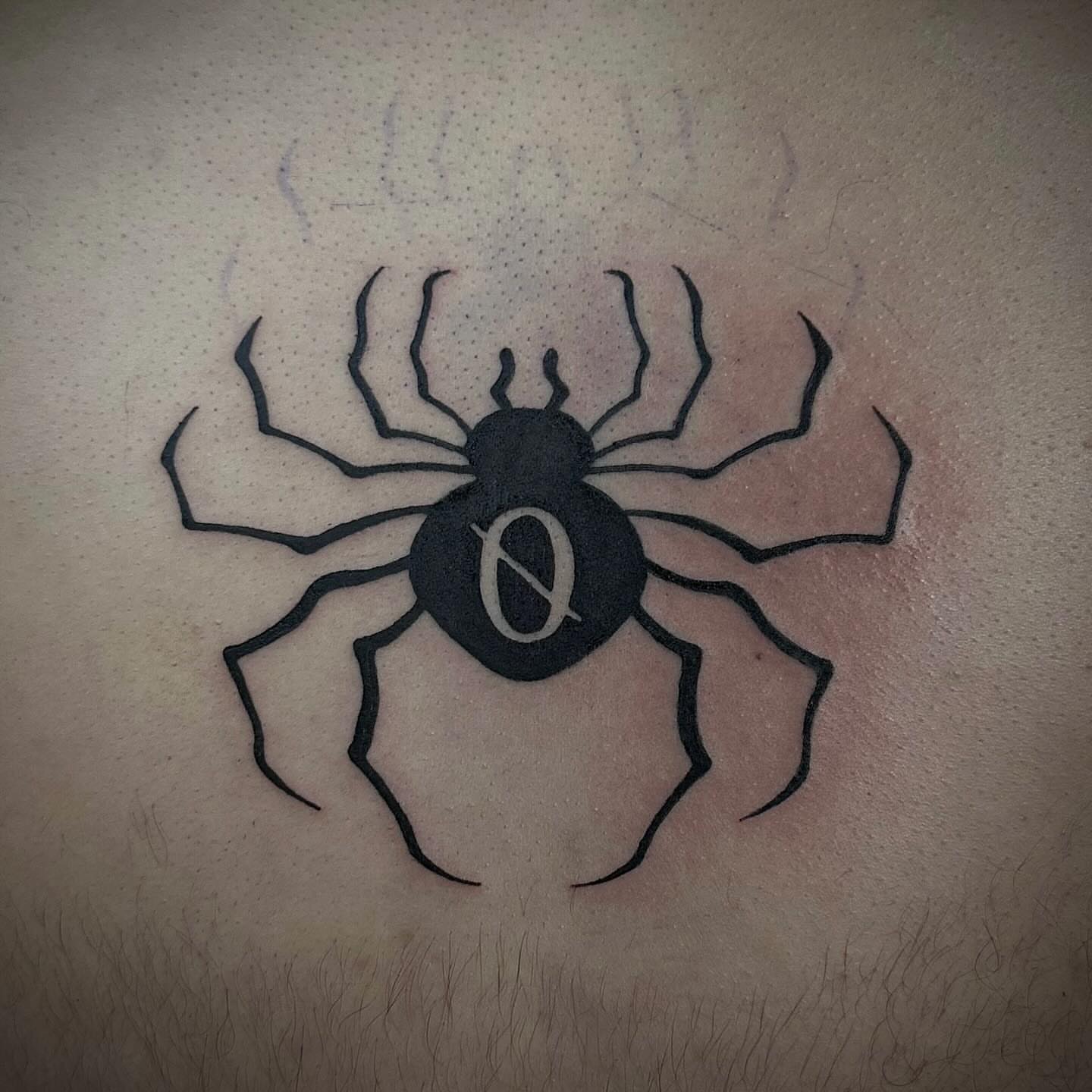 Spider dotwork tattoo on the torso by Emily‹𝟹