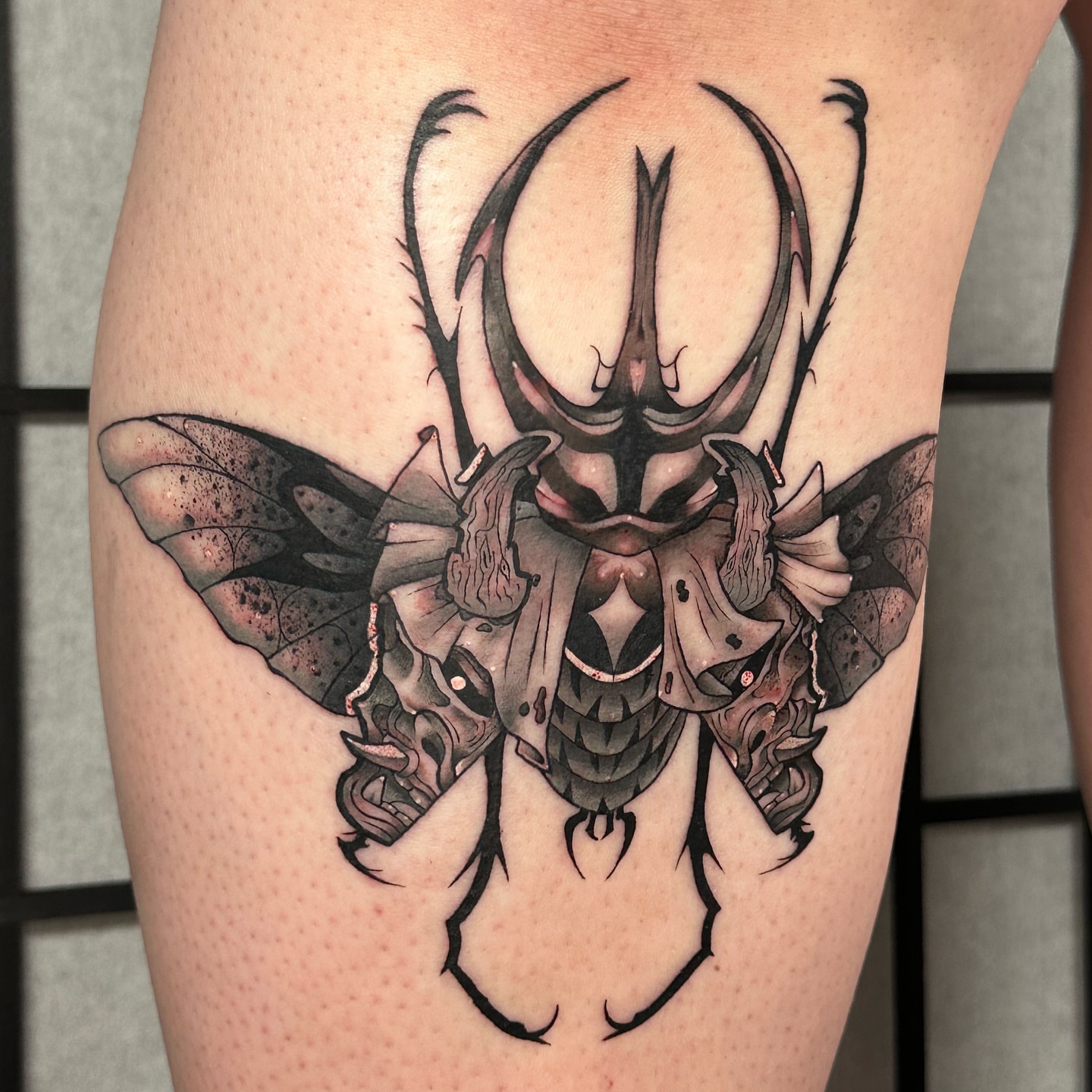 Insect dark realism tattoo on the thigh by Taylin Johnson- Illustrative Blackwork, Columbus, Ohio