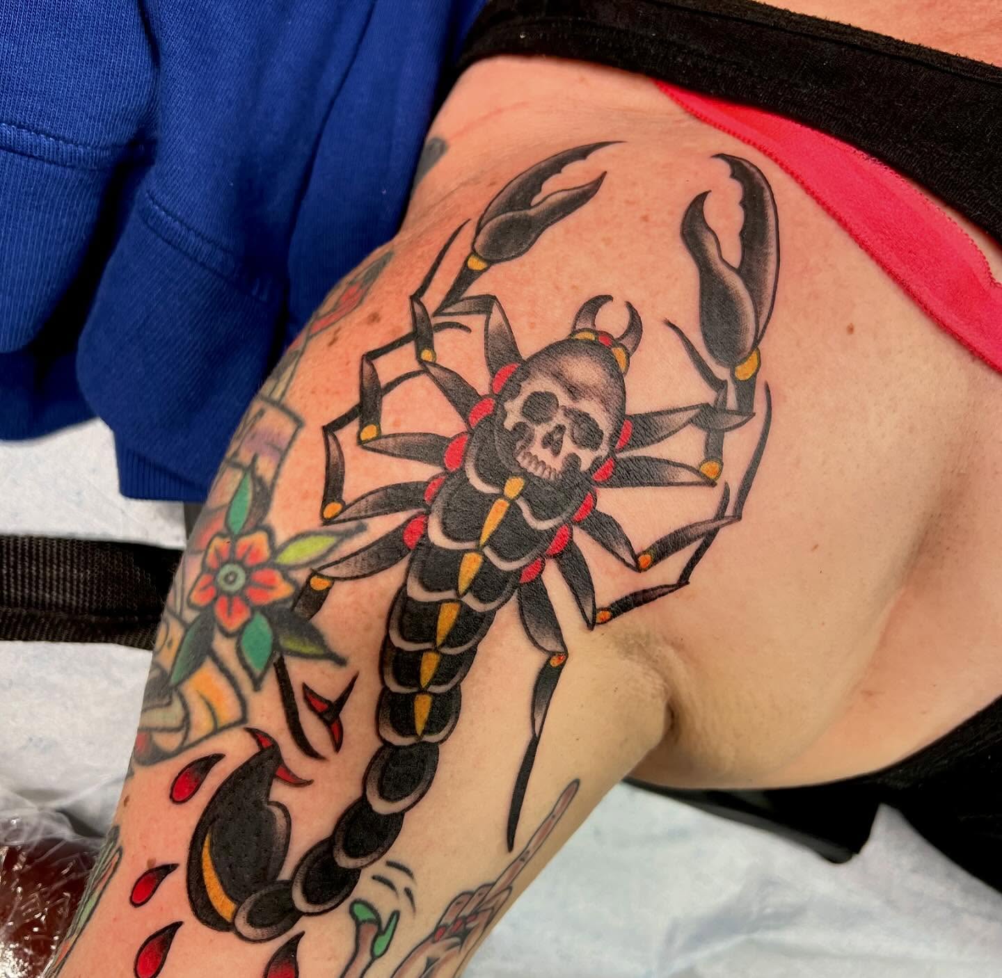 Scorpion American traditional tattoo on the thigh by Dustin Hysell