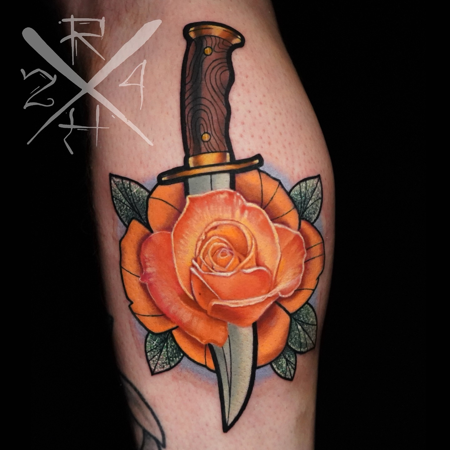 Knife and rose American traditional tattoo on the forearm by Ryan