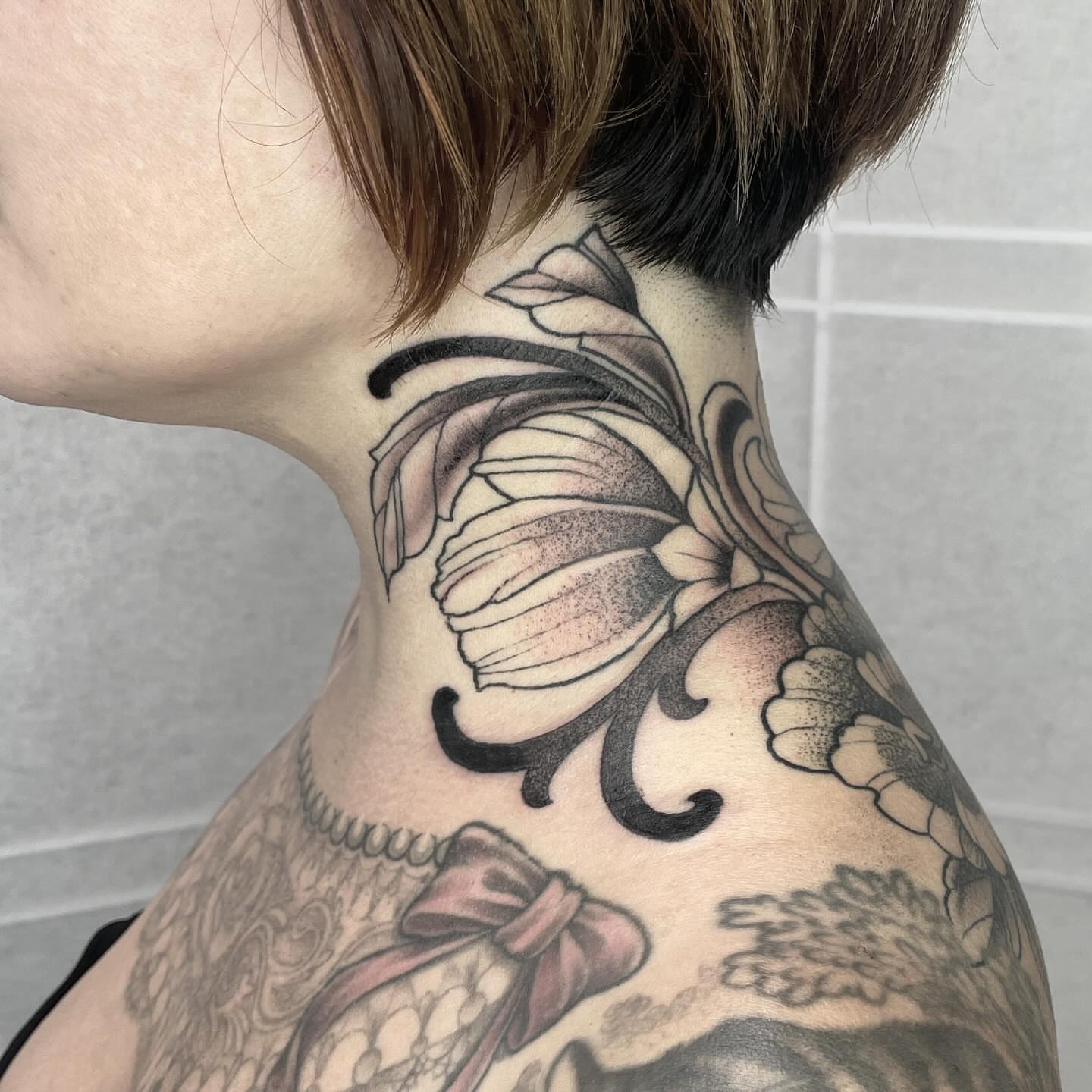 Butterfly black and grey tattoo on the neck by Amanda Marie, Edmonds, Washington