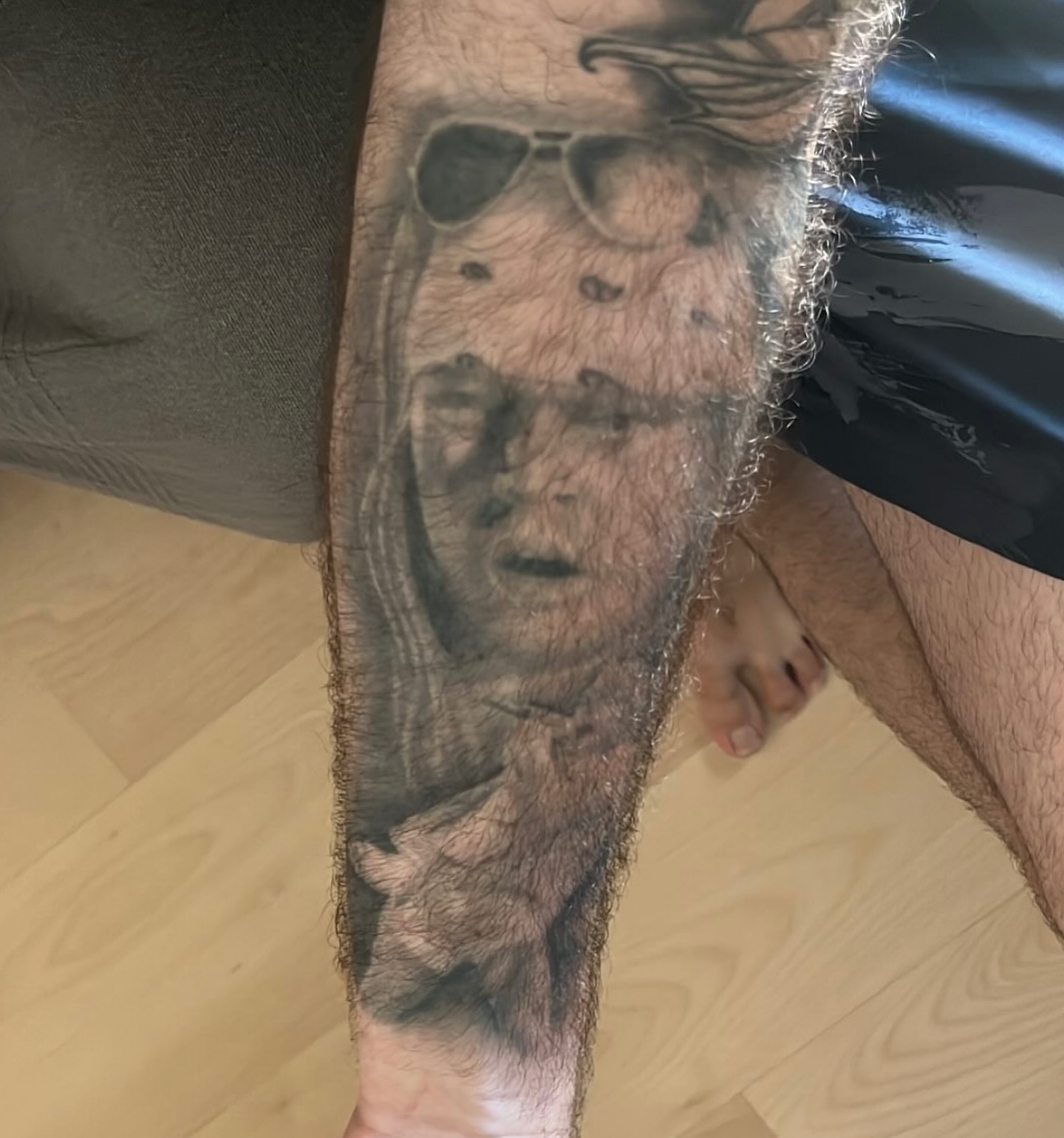 Man with sunglasses realism tattoo on the forearm by Cristian Romero