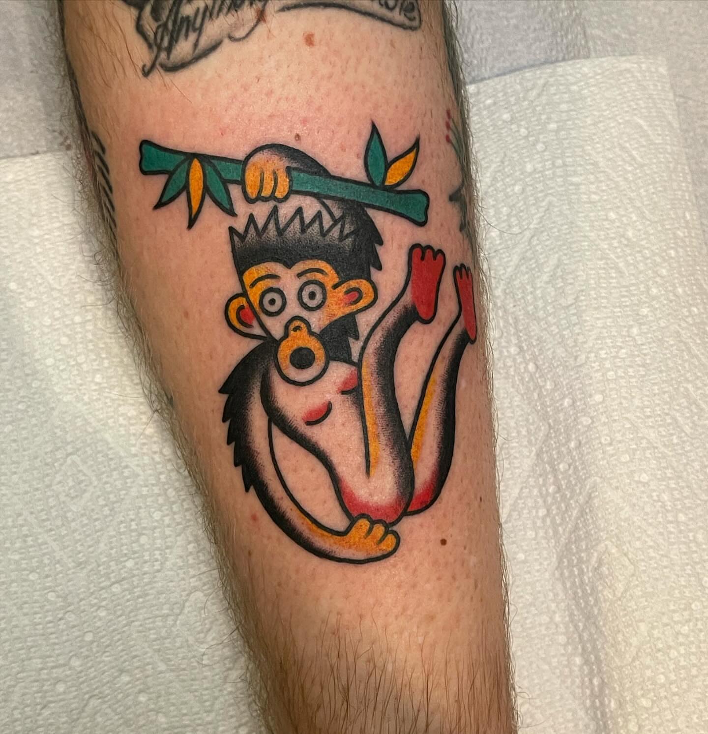 Monkey American traditional tattoo on the forearm by James Shepherd, Austin, Texas