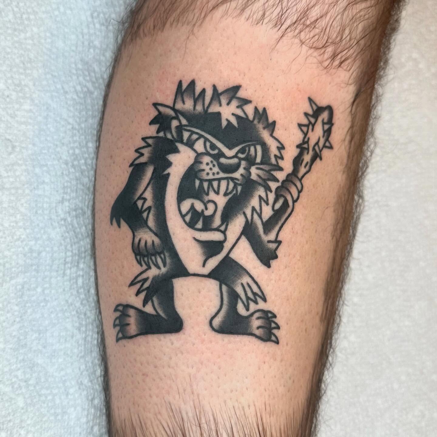 Roaring lion black and grey tattoo on the forearm by Keon Ostby, Tempe, Arizona