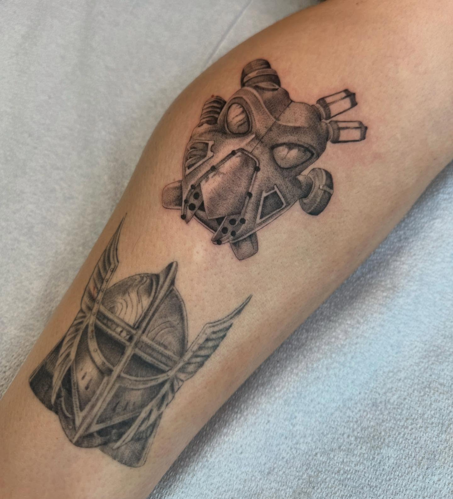 Spaceship realism tattoo on the forearm by Alyssa . Villela