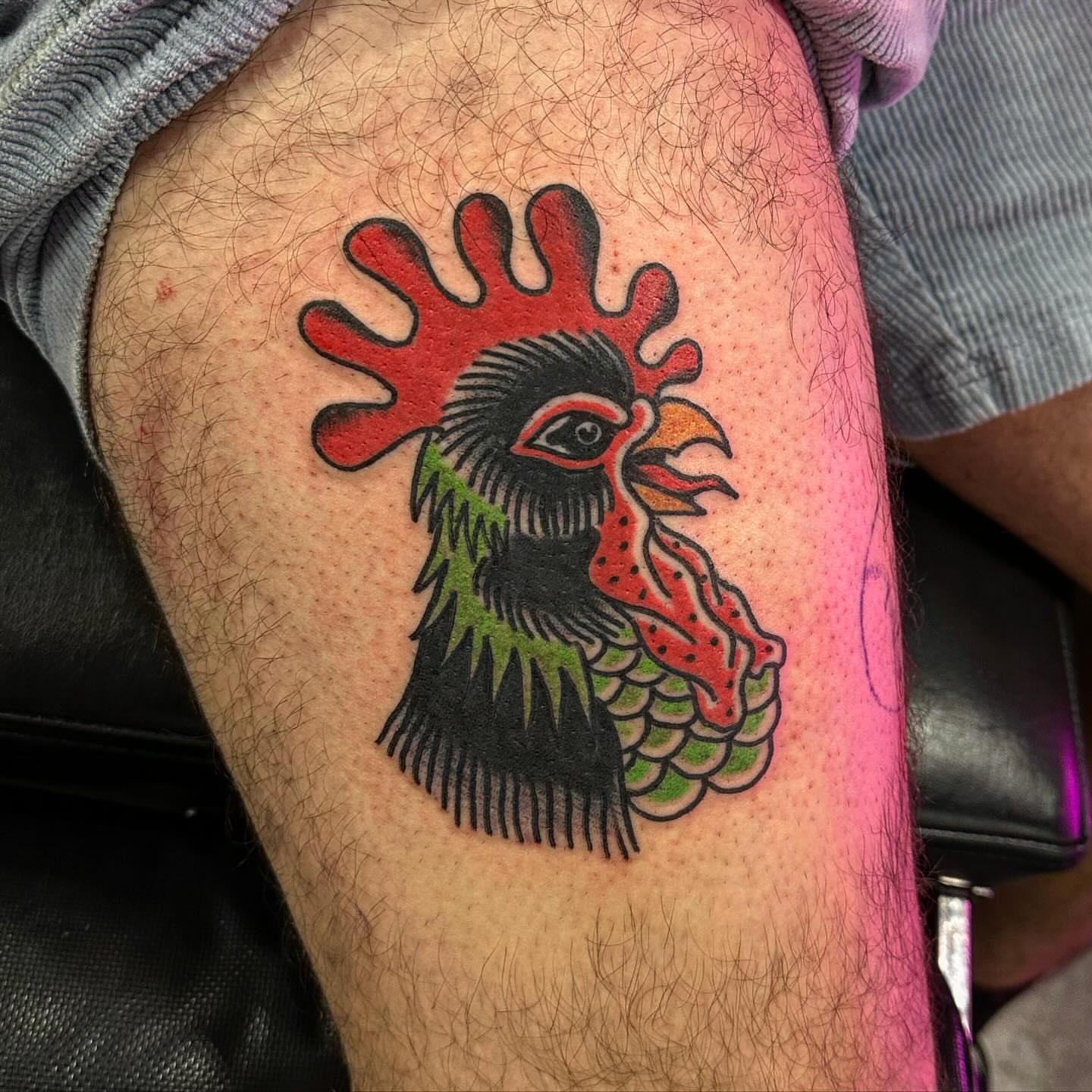 Rooster American traditional tattoo on the thigh by Jackie