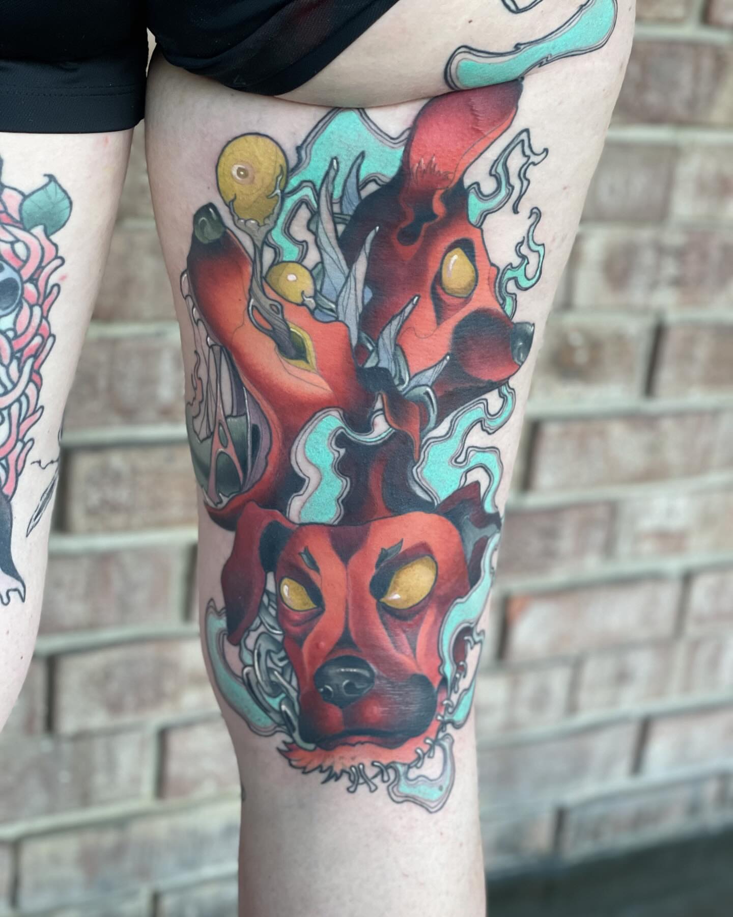 Red fox American traditional tattoo on the thigh by Nathan Evans