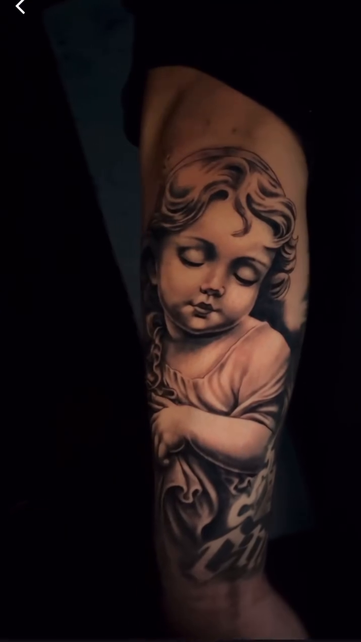 Cherub realism tattoo by Xando