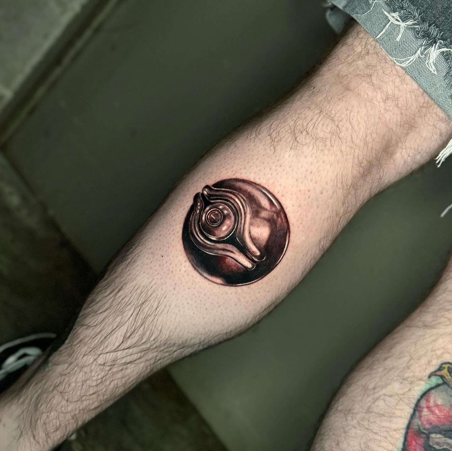 Abstract swirl realism tattoo on the forearm by Mel