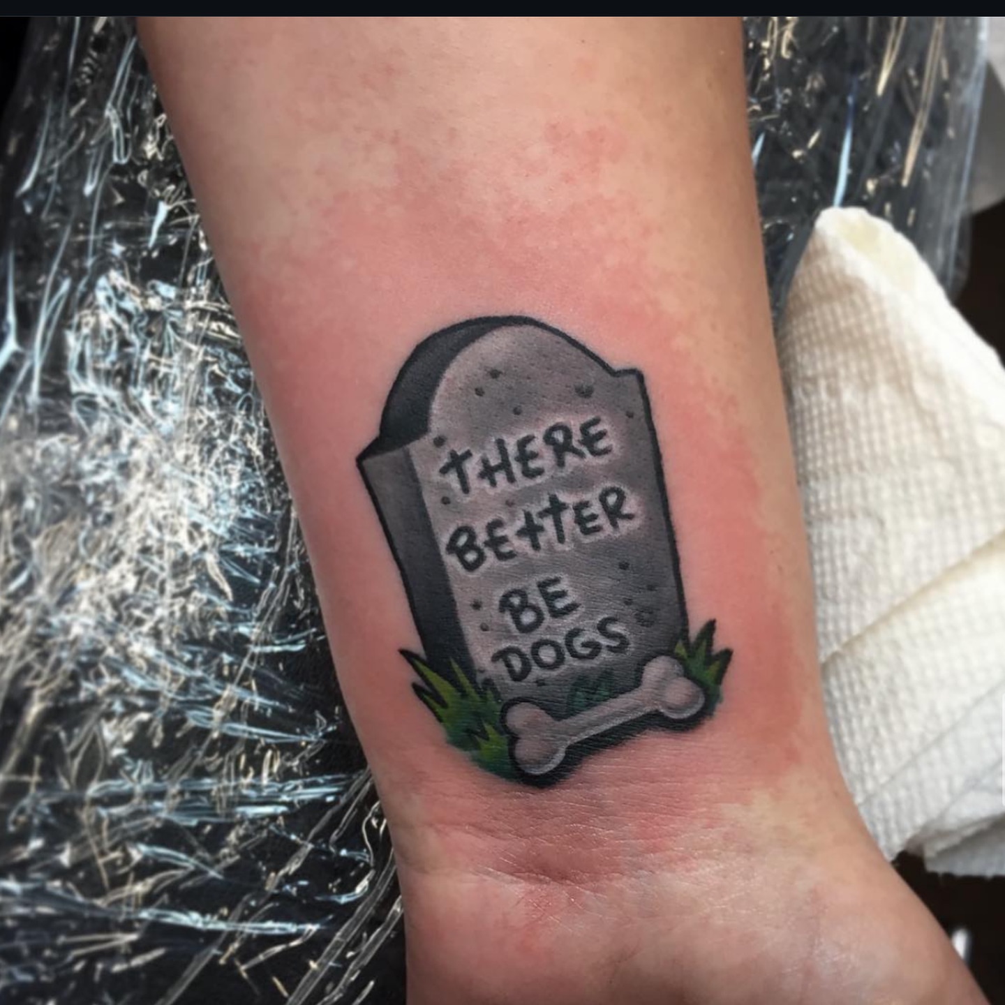 Graveyard marker black and grey tattoo on the forearm by Alexandra Fische