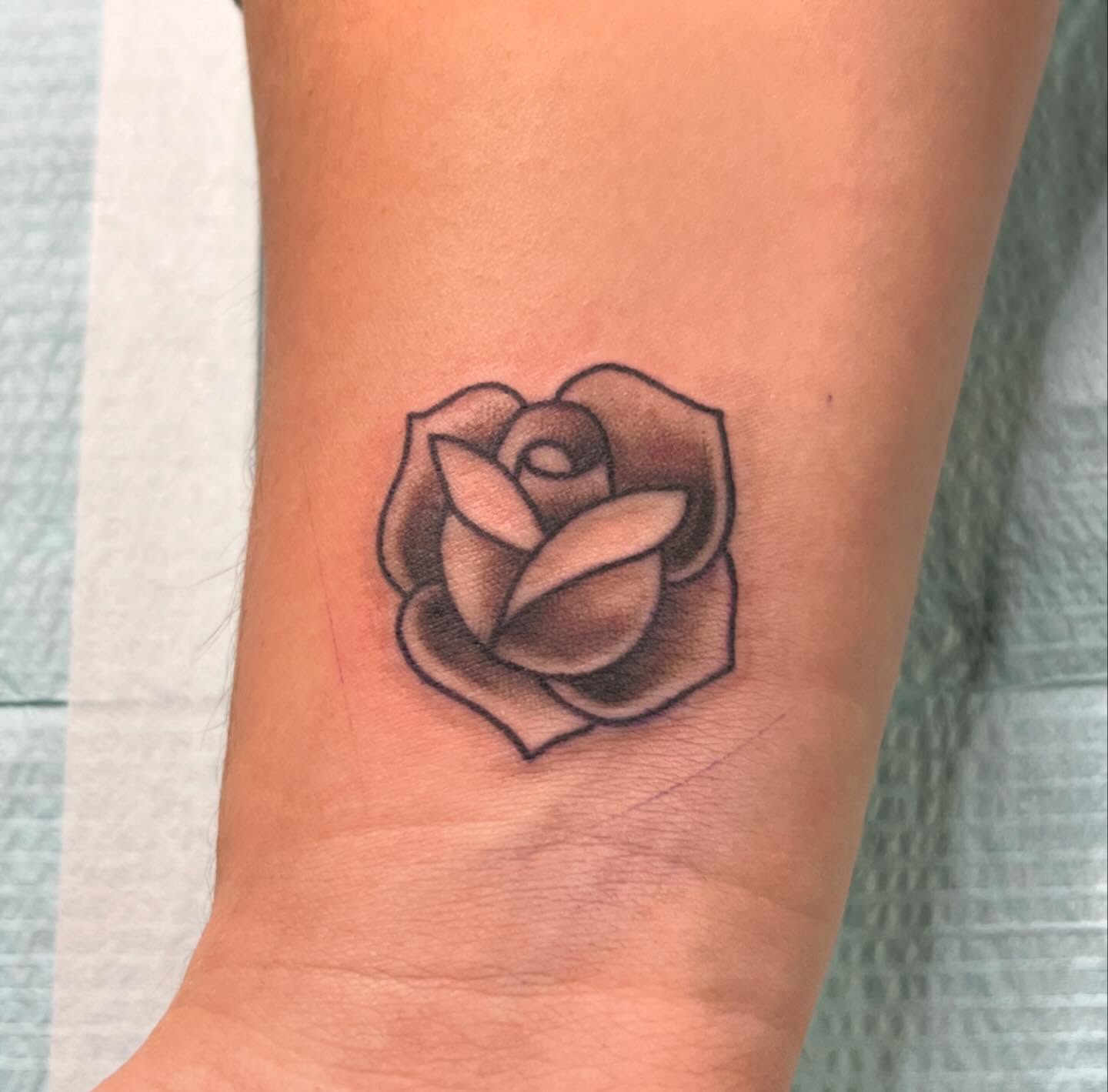 Rose black and grey tattoo on the forearm by Dustin Quillen Tattoo Artist, Campbellsville, Kentucky