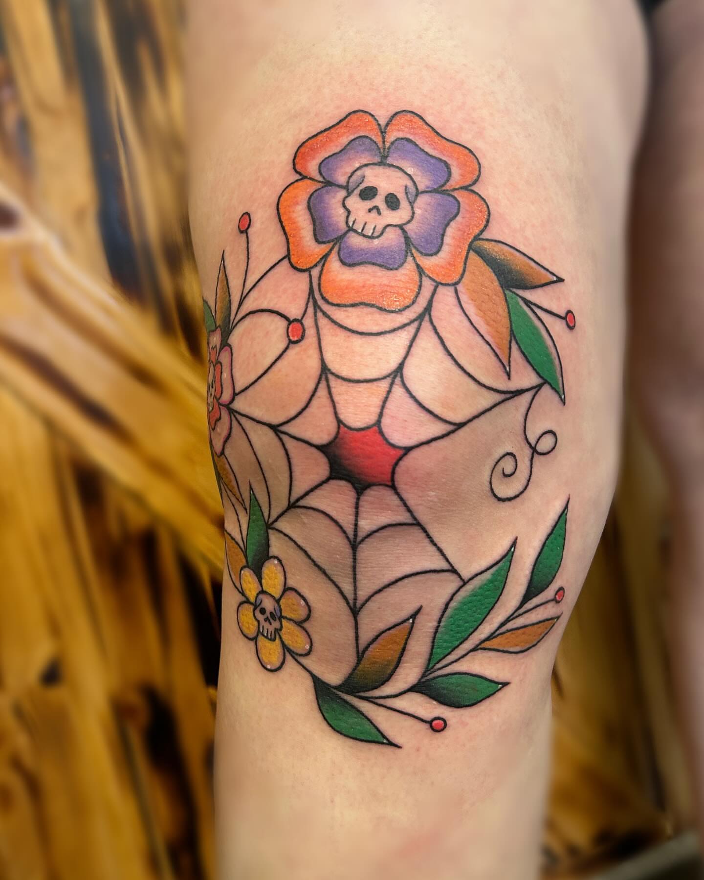 Flower with skull American traditional tattoo on the thigh by ππππππ ππππππ