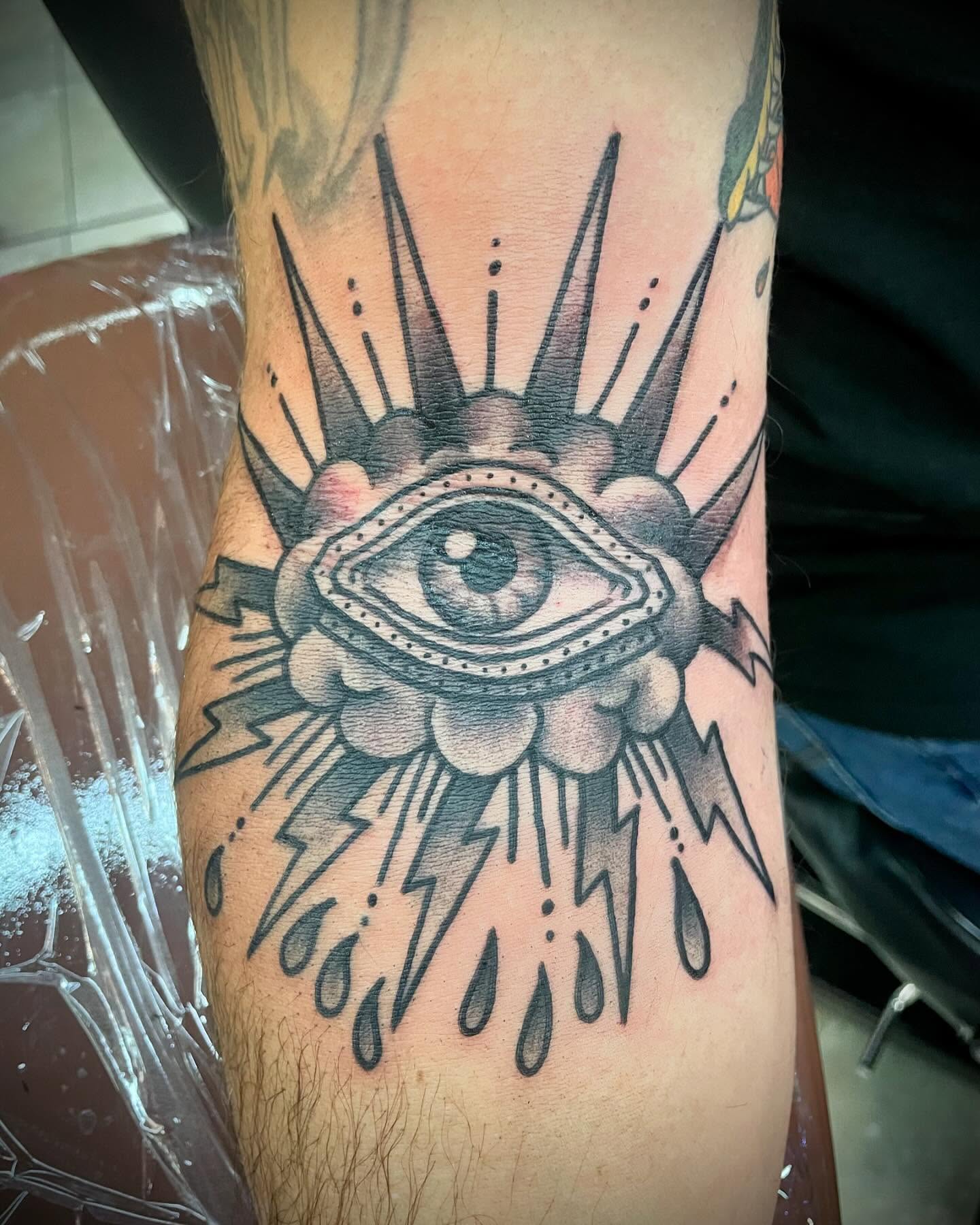 Eye with spikes American traditional tattoo on the forearm by tattoos by lego