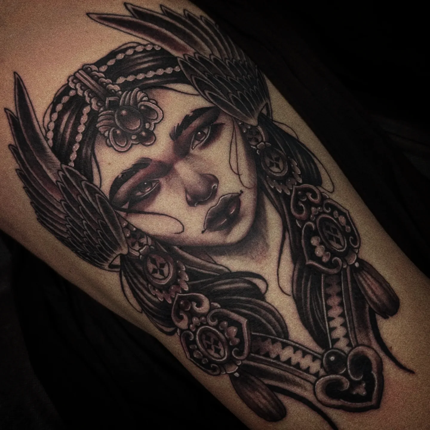 Woman with wings American traditional tattoo on the thigh by 𝑹𝒆𝒚𝒎𝒂𝒓𝒄 𝑫𝒂𝒚𝒂𝒖𝒐𝒏