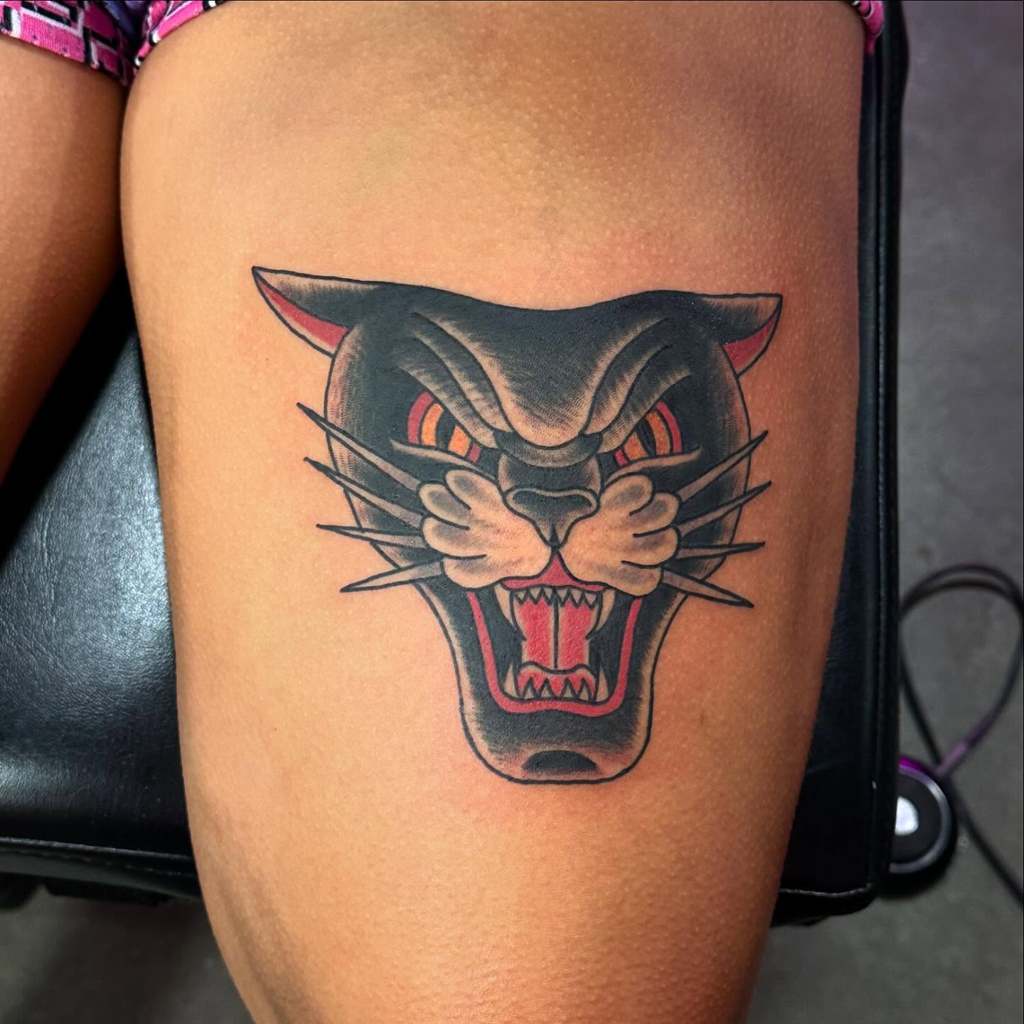 Panther American traditional tattoo on the thigh by Jackie